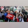 Protestors rally for a cease fire in Gaza outside a UAW union hall during a visit by President Joe Biden