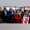 Former President Donald Trump greets supporters and patrons at Versailles Cuban Restaurant