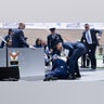 President Joe Biden is helped up after falling during the graduation ceremony at the United States Air Force Academy