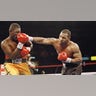 Mike Tyson lands punch