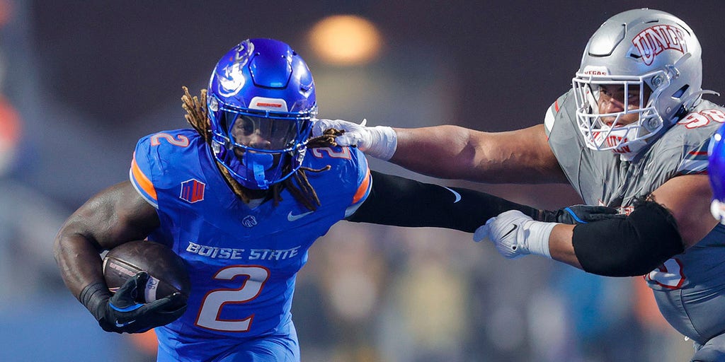 Heisman hopeful Ashton Jeanty points to his faith after playoff-bound Boise State wins Mountain West title