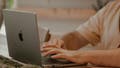 A man typing on his laptop - Fox News