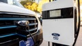 A charger Ford Pro AC charging Station is displayed charging a Ford Transit electric vehicle during the AutoMobility LA 2024 auto show at the Los Angeles Convention Center on November 21, 2024. (Photo by ETIENNE LAURENT / AFP) (Photo by ETIENNE LAURENT/AFP via Getty Images) - Fox News