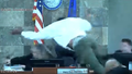 Deobra Redden is seen launching over the desk of Judge Mary Kay Holthus during his sentencing in a felony battery case on Wednesday, Jan. 3, 2024 in Las Vegas. - Fox News
