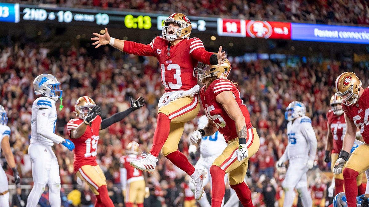 Brock Purdy celebrates touchdown