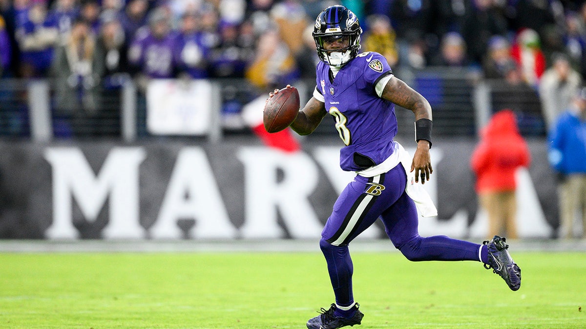 Lamar Jackson looks down field