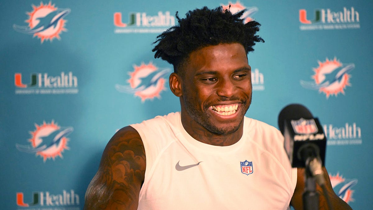 Tyreek Hill smiles in press conference