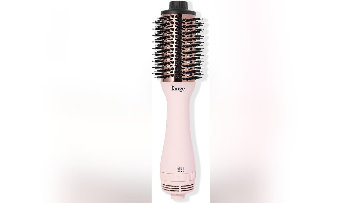 Blow dry and curl your hair in one go. 