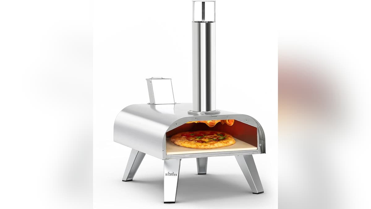 A pizza oven makes pizza fast. 
