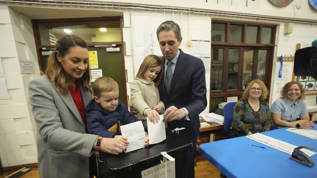 Irish prime minister casts his vote with family