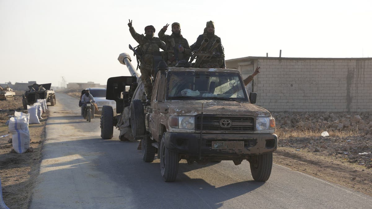 Rebels in Northwestern Syria Seize Government Military Vehicles on the Road to Kweris Airport in the Eastern Province of Aleppo on December 2, 2024.