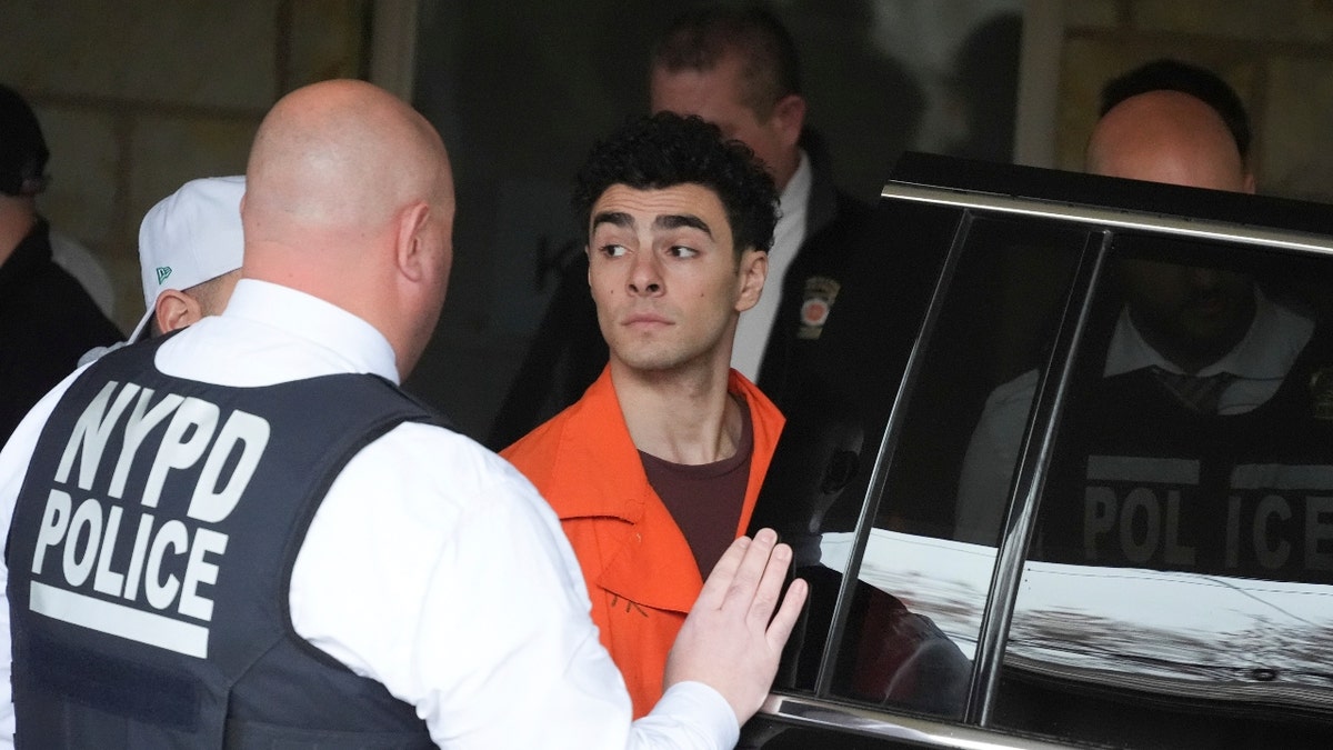 Luigi Nicholas Mangione leaves at Blair County Courthouse in Hollidaysburg, Pa., Thursday, Dec. 19, 2024.