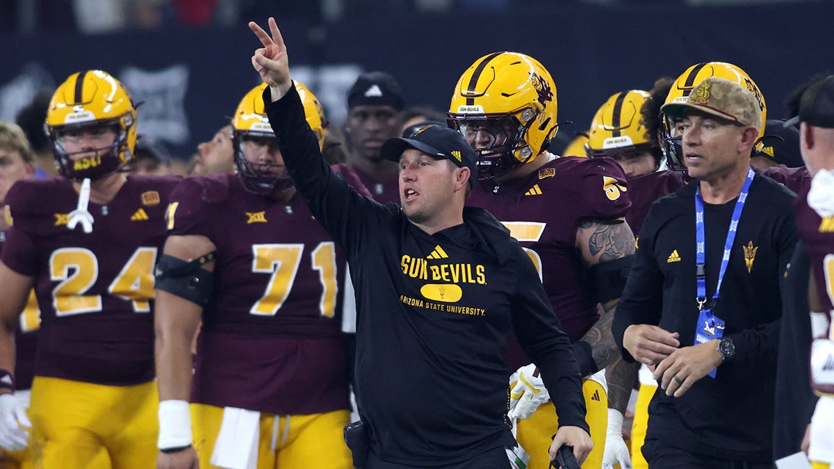 Kenny Dillingham stands on the sidelines