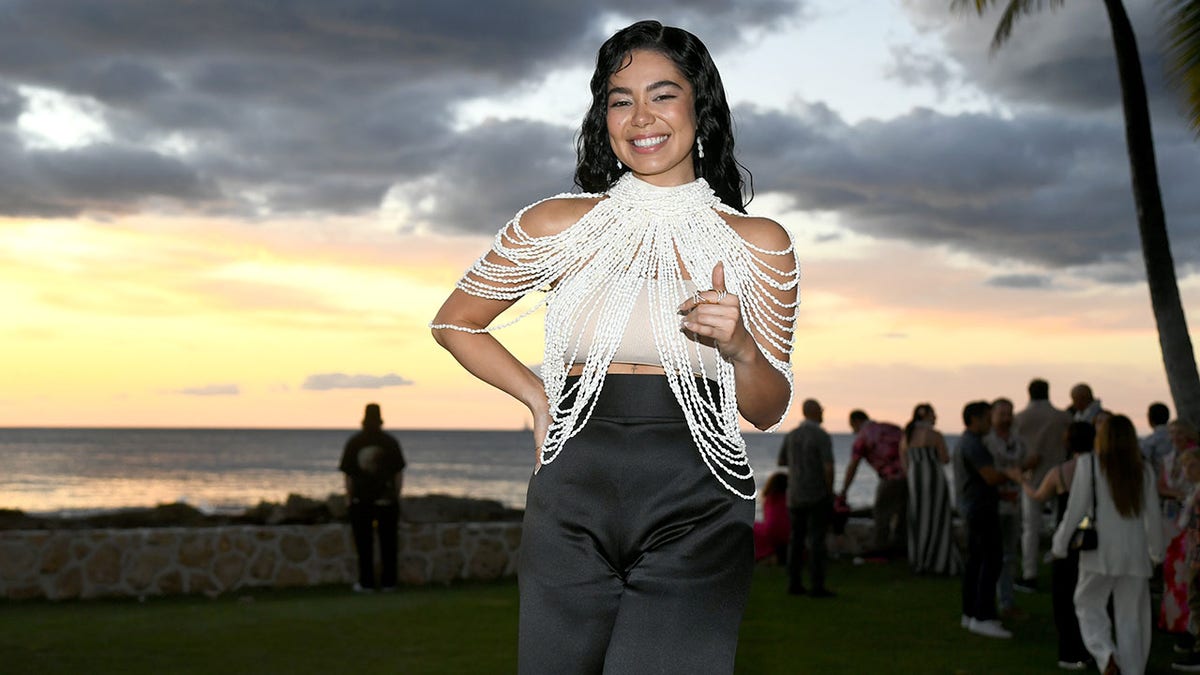 Cravalho smiling at the camera