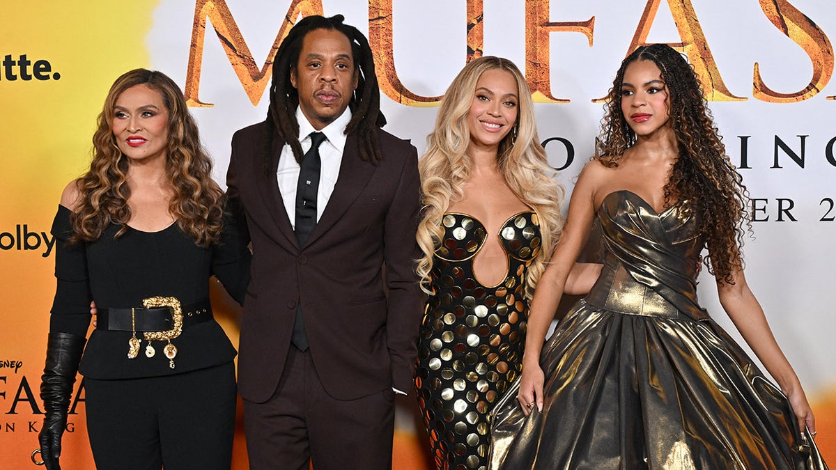 Beyonce sparkles in shimmering dress next to husband Jay-Z and daughter blue ivy