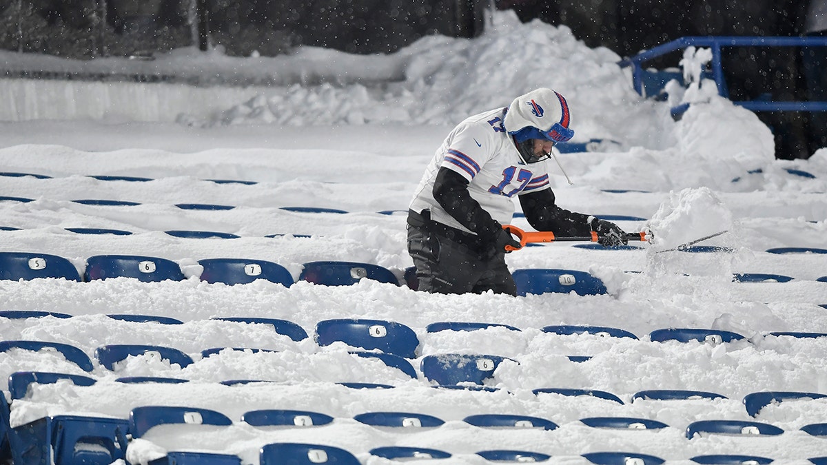 Bills fan shovels snow