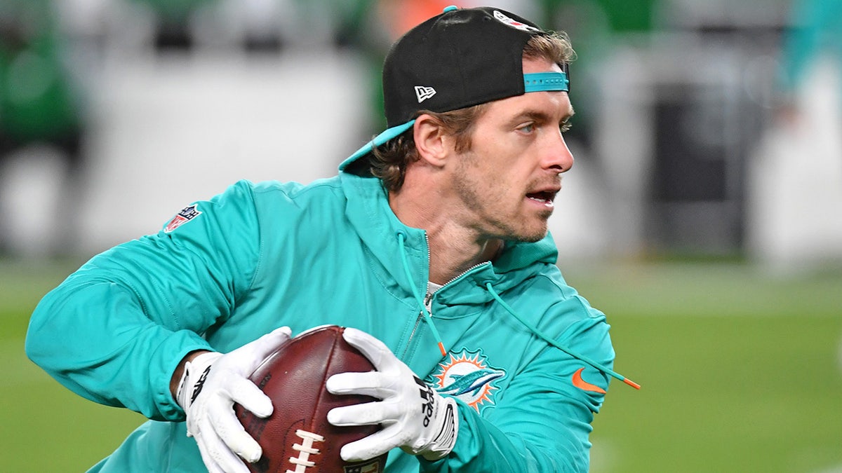 Braxton Berrios warms up