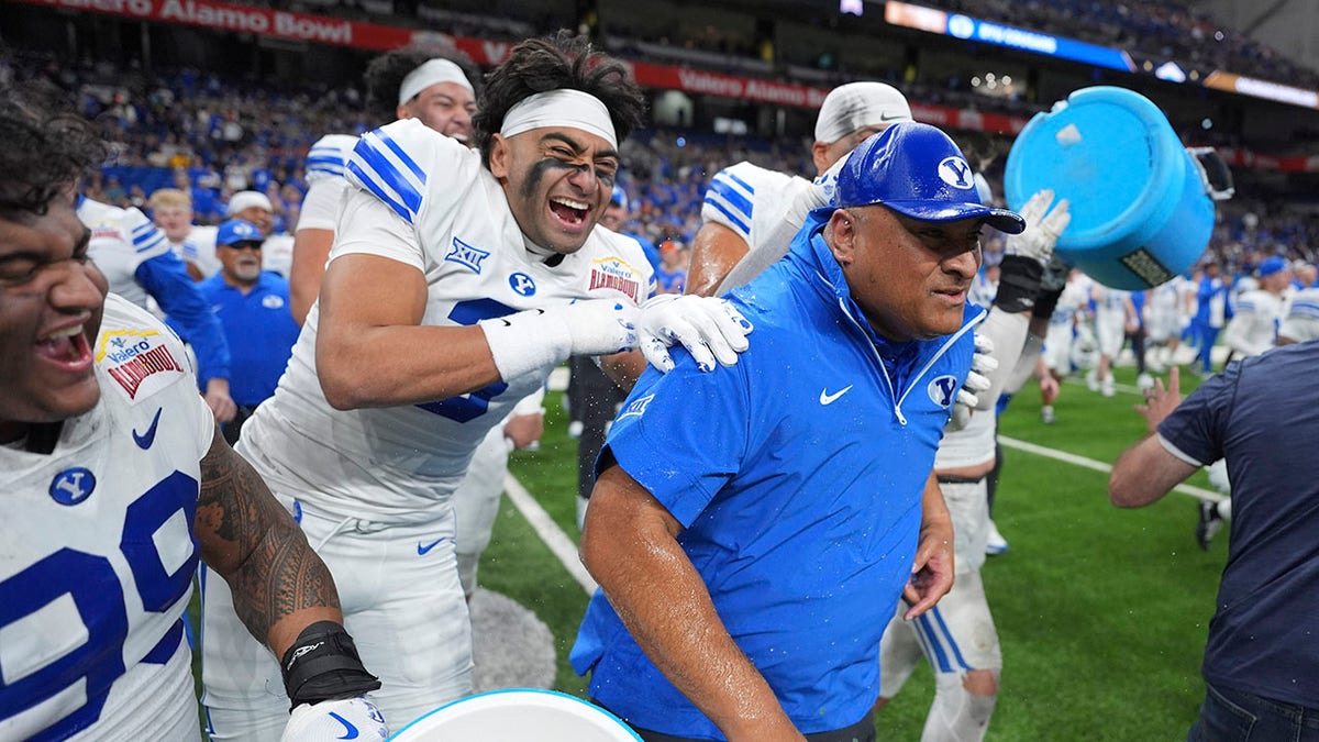 Kalani Sitake celebrates