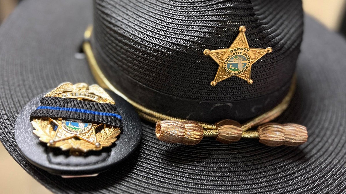 Charlotte County deputy's hat, a thin blue stripe over the badge