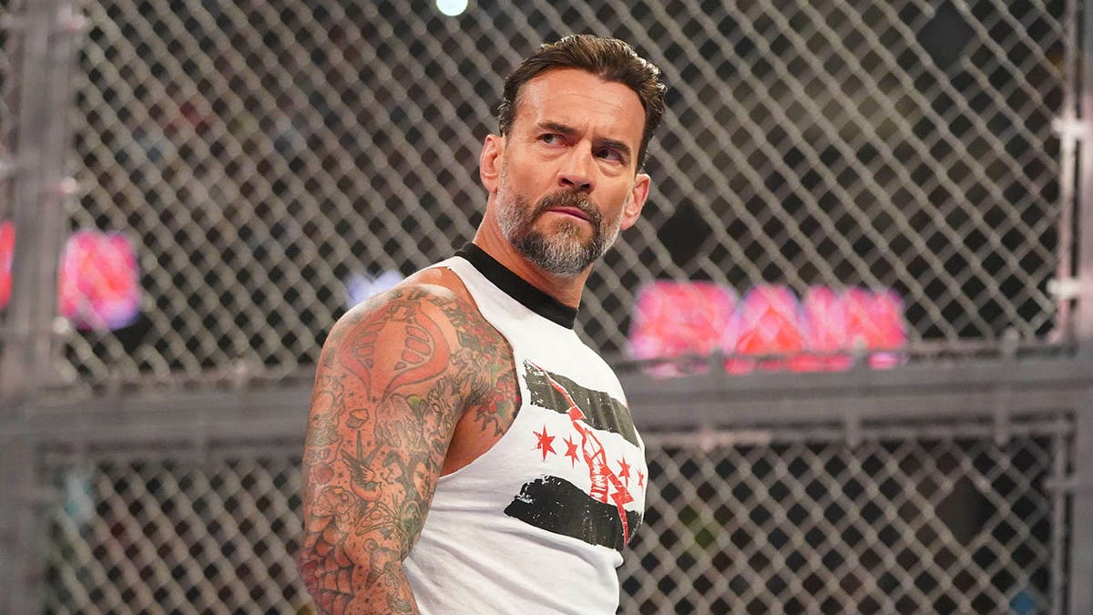 CM punk enters the ring