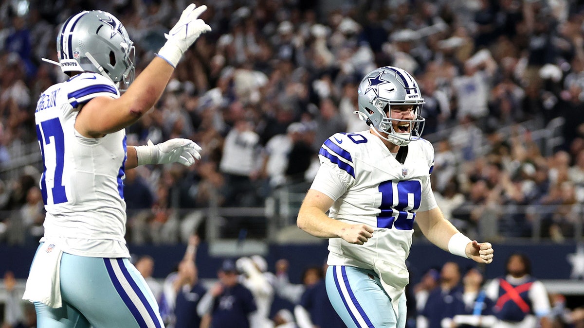 Cooper Rush celebrates