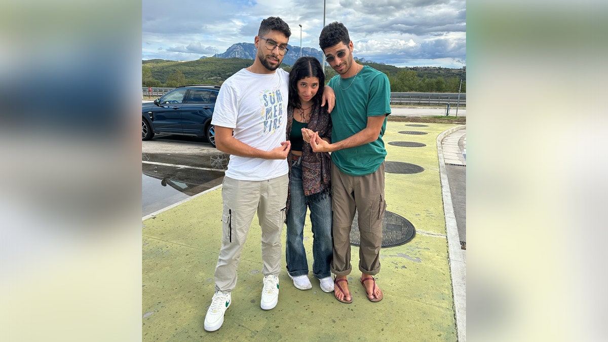 Evyatar David (Left), sister Yaela, (center) and brother Ilay David (Right) pose for a picture during happier times for the family.