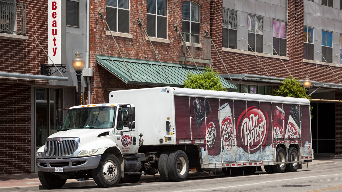 A Dr. Pepper delivery truck is parked on a street in downtown Dallas, April 7, 2016.