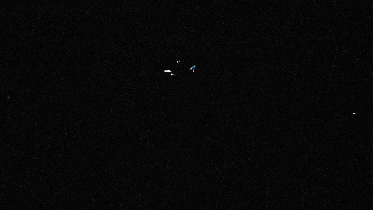 Photo taken from a section of Toms River Bayshore, showing what appears to be a large drone circling the area