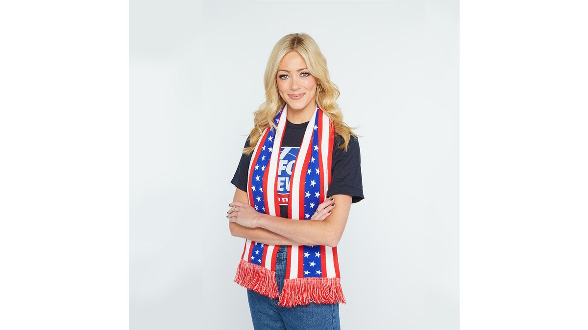 Stay warm in your red, white and blue scarf. 