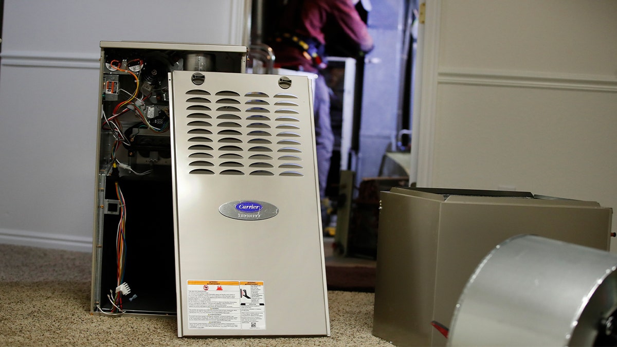 A new Carrier natural gas furnace at a residential home in Spanish Fork, Utah, on Tuesday, Oct. 19, 2021. 