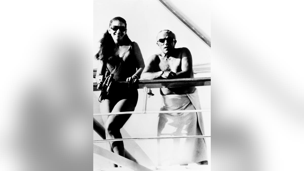 Maria Callas and her lover Onassis smile in swimsuits