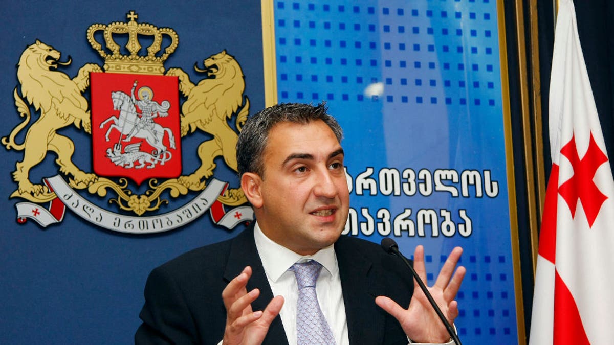 The then Georgian Prime Minister Nika Gilauri speaks at a press briefing in Tbilisi on August 21, 2009.   