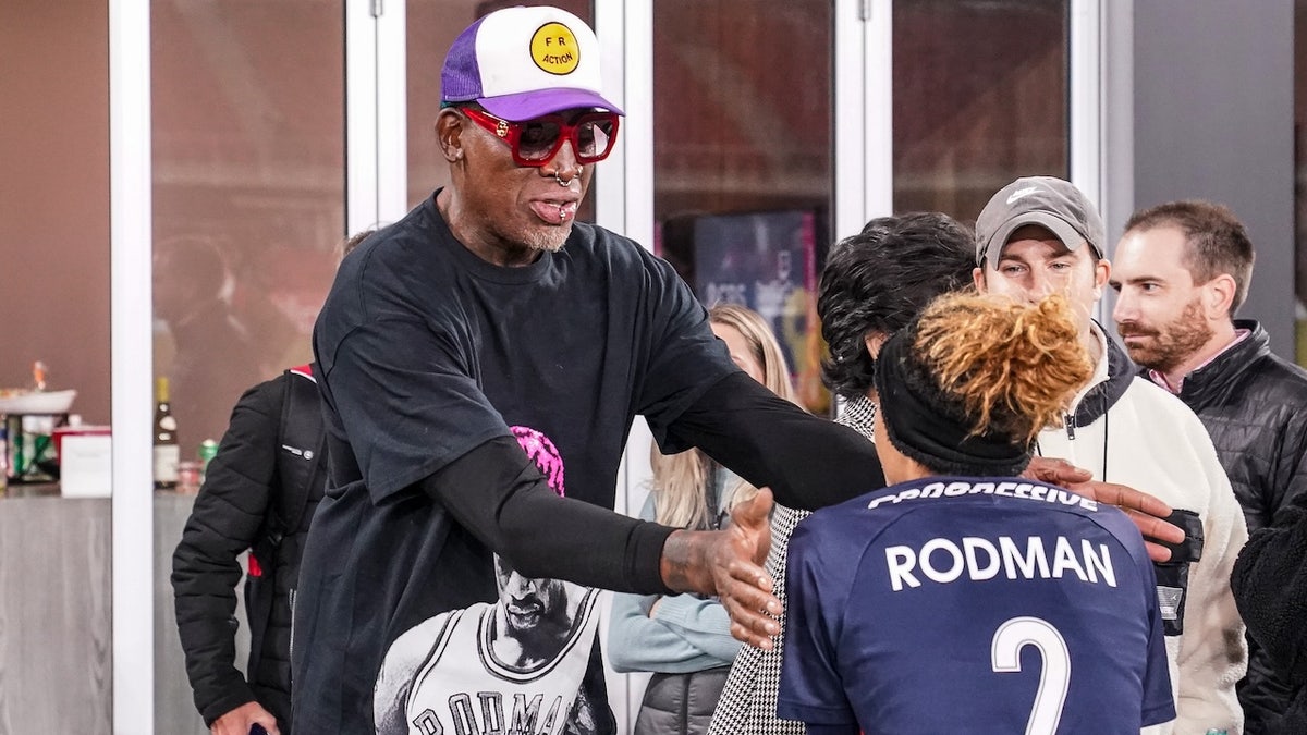 Washington Spirit forward Trinity Rodman (2) with her father basketball legend Dennis Rodman after a game between North Carolina Courage and Washington Spirit at Audi Field on Nov. 7, 2021 in Washington, D.C. 