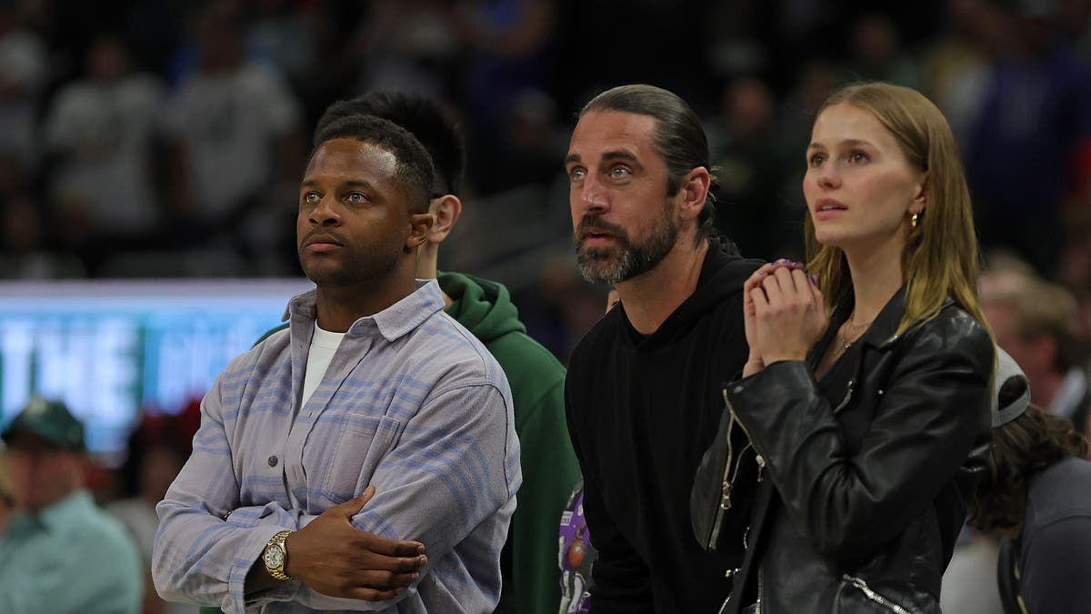 Randall Cobb, Aaron Rodgers and Mallory Edens