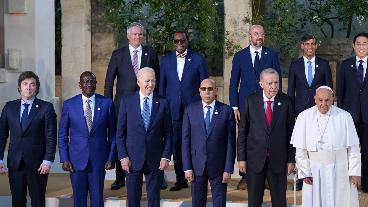 Pope Francis, front row, right, poses for a photo with participants on day two of the Group of Seven (G-7) leaders summit at the Borgo Egnazia resort in Savelletri, Italy, on Friday, June 14, 2024. 