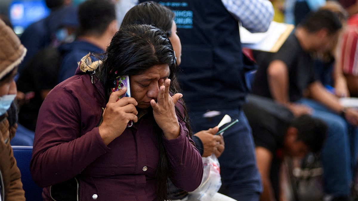 Guatemalan immigrant talking on the phone