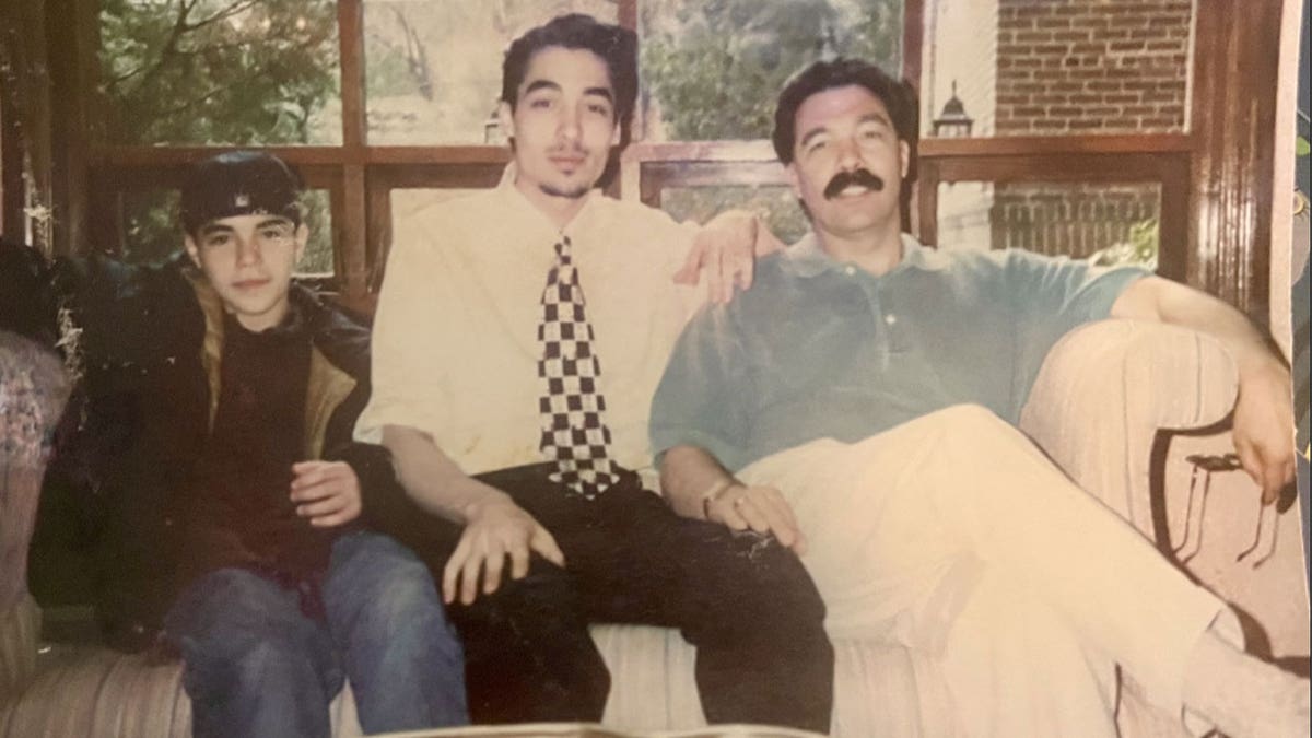 David Marcus (center), recalls learning from his Jewish father, Bobby (r.), how to make Christmas special for his younger brother, Jon (l.).