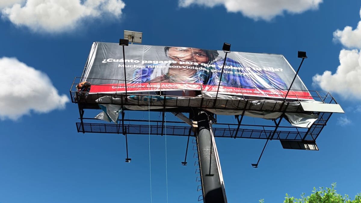 billboard for migrants