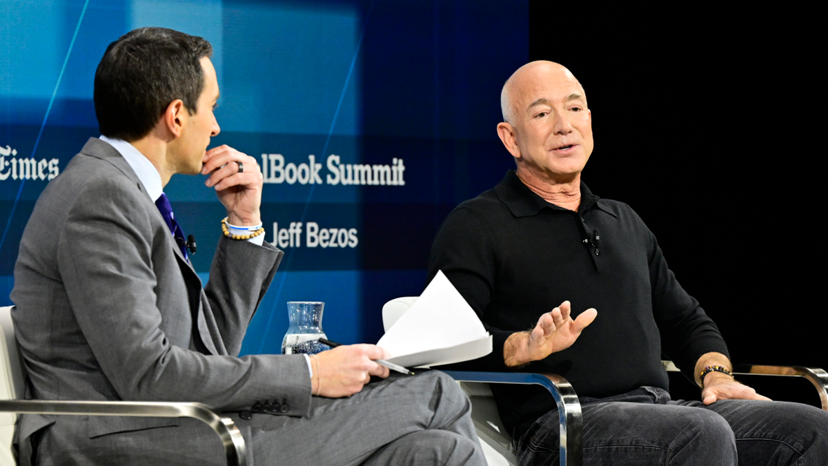 Jeff Bezos speaks on the stage