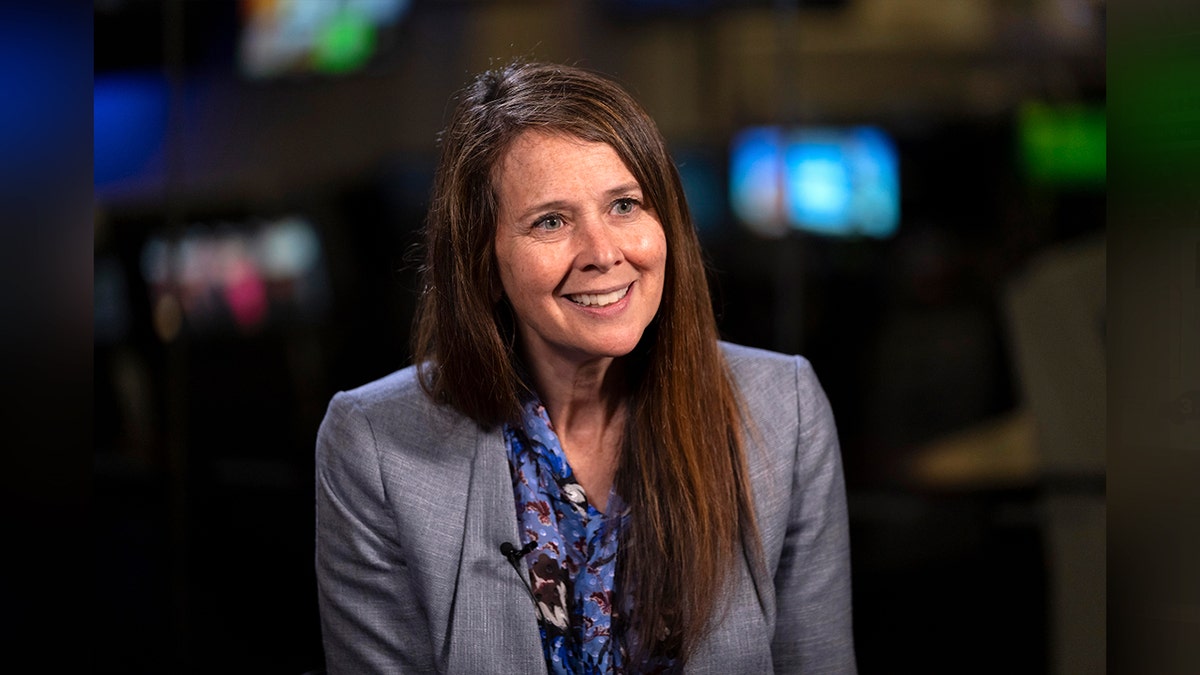 jen easterly smiles during interview