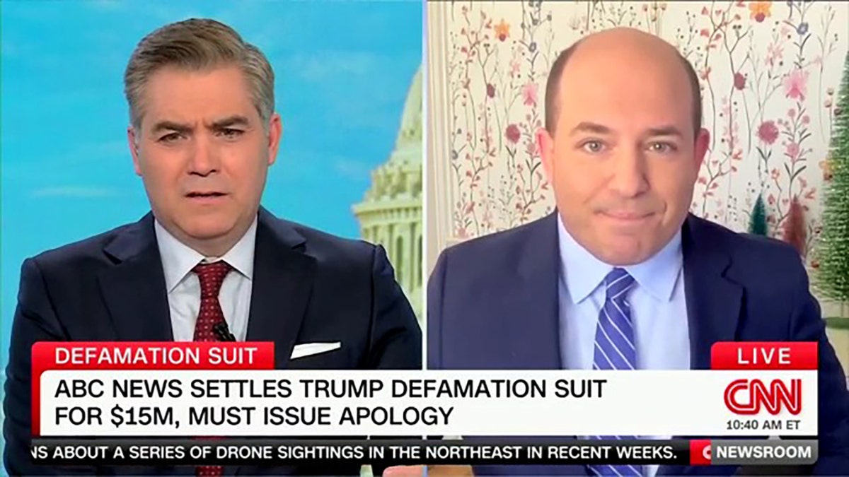 Jim Acosta y Brian Stelter