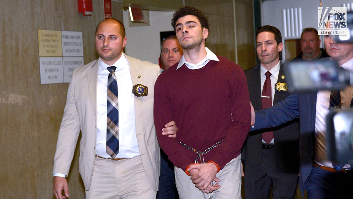 Luigi Mangione departs the courtroom pursuing  his arraignment