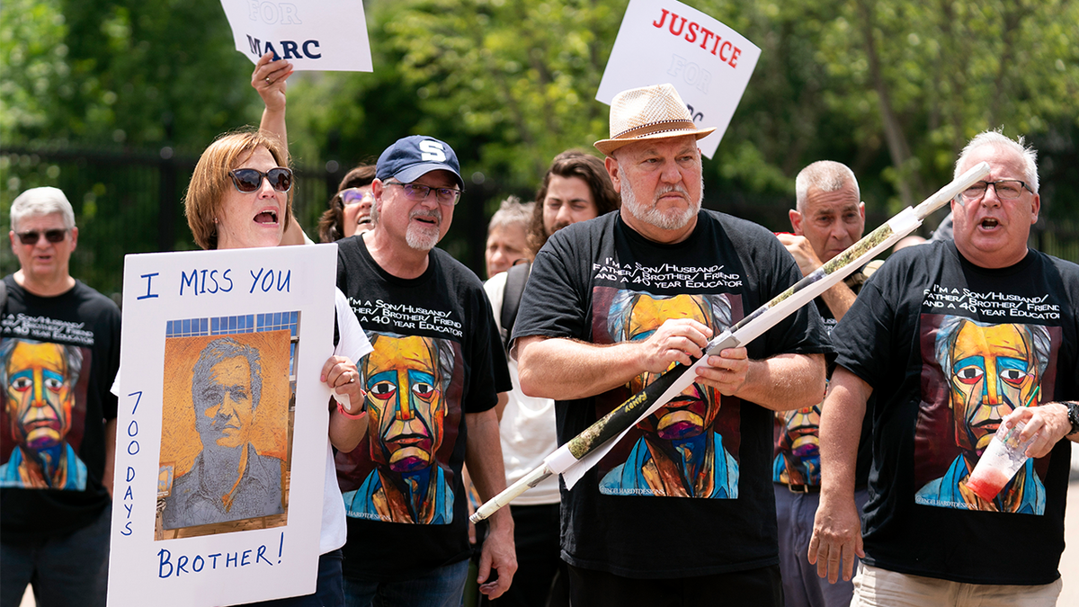 Members of Mark Fogel's family at a rally outside the White House