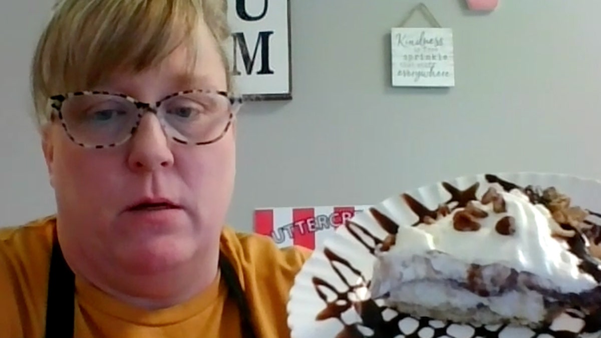 Misti Stowers shows off a Possum Pie that she created at her Buttercream Bakery and Frozen Custard in Pocahontas, Arkansas.