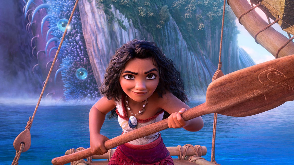 Still of animated character Moana holding a paddle