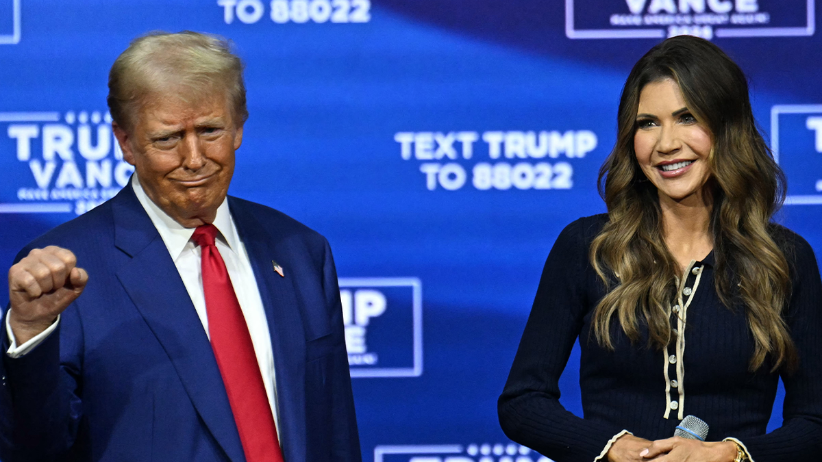 Kristi Noem, right, with President Trump