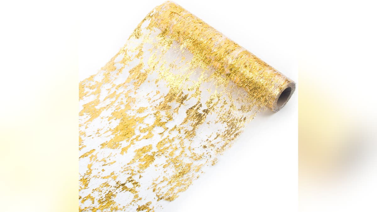 This table runner will add luxe and glitz to your party table.