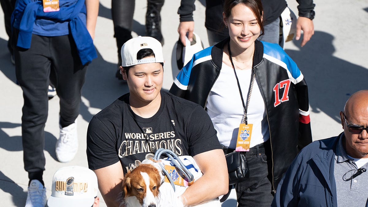 Parade with his wife