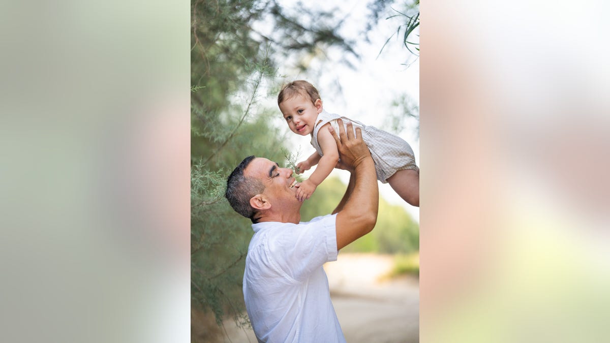 Omri and his son, Roni.