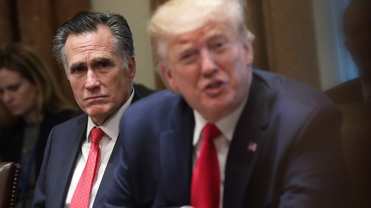 Photo from 2019: Mitt Romney (left) with President Trump (right).